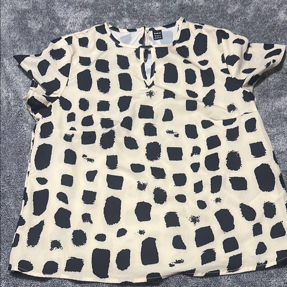 H&M Black and Cream Skirt with Playful Abstract Pattern